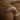 Close-up of smooth tan leather armrest with detailed stitching on Librina Arm Chair cushion