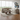 Roxy Night 3 Corner 3 Fabric Sofa in beige with plush cushions in a modern living room setting with large windows and artwork.
