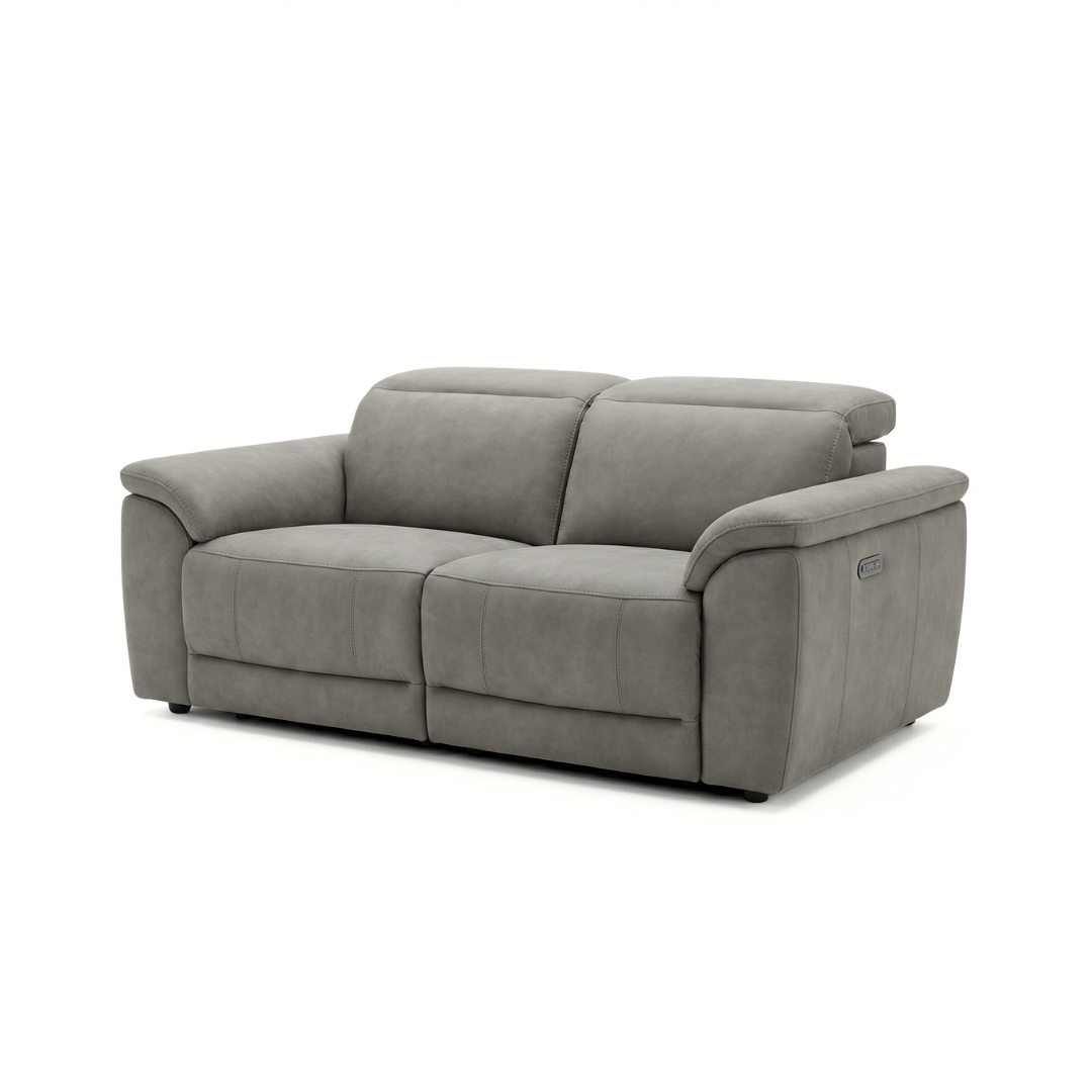 Sorrento grey fabric three-seater power recliner sofa without console, angled view on white background