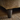 Close-up detail of Taeo sofa olive green chenille fabric texture and dark walnut-effect wooden leg