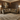 Taeo corner sofa in olive green chenille styled in a contemporary living room with wooden wall panelling and warm ambient lighting