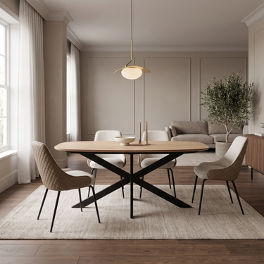 Sadina oval dining set with oak-effect table, black starburst base and four biscuit chairs in a panelled dining room