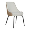 Sadina dining chair in biscuit fabric with quilted leather-effect outer back and black metal legs, angled view