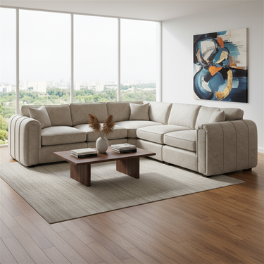 Roxy Night 3 Corner 3 Fabric Sofa in beige with plush cushions in a modern living room setting with large windows and artwork.