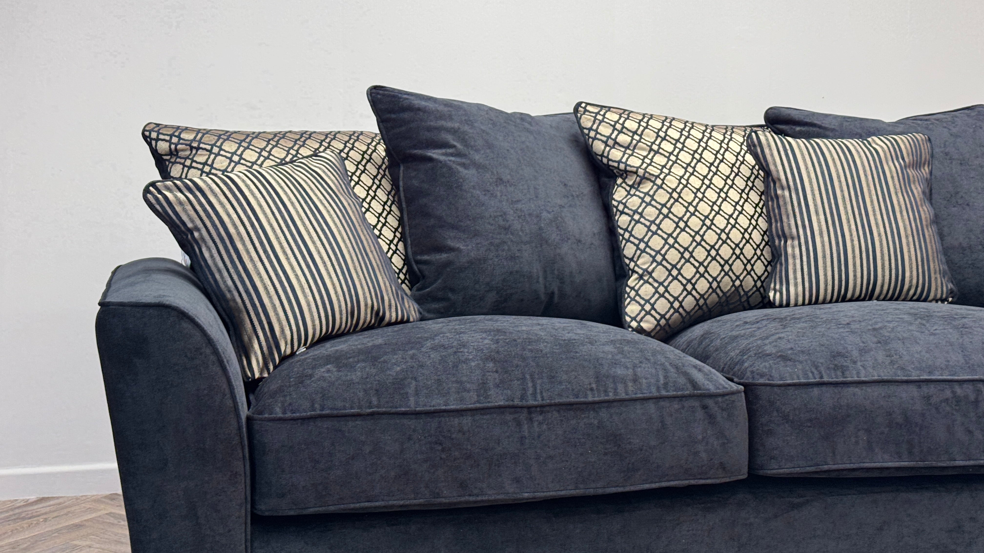 Fantasia Corner Sofa & Footstool Black Fabric Pillow Back