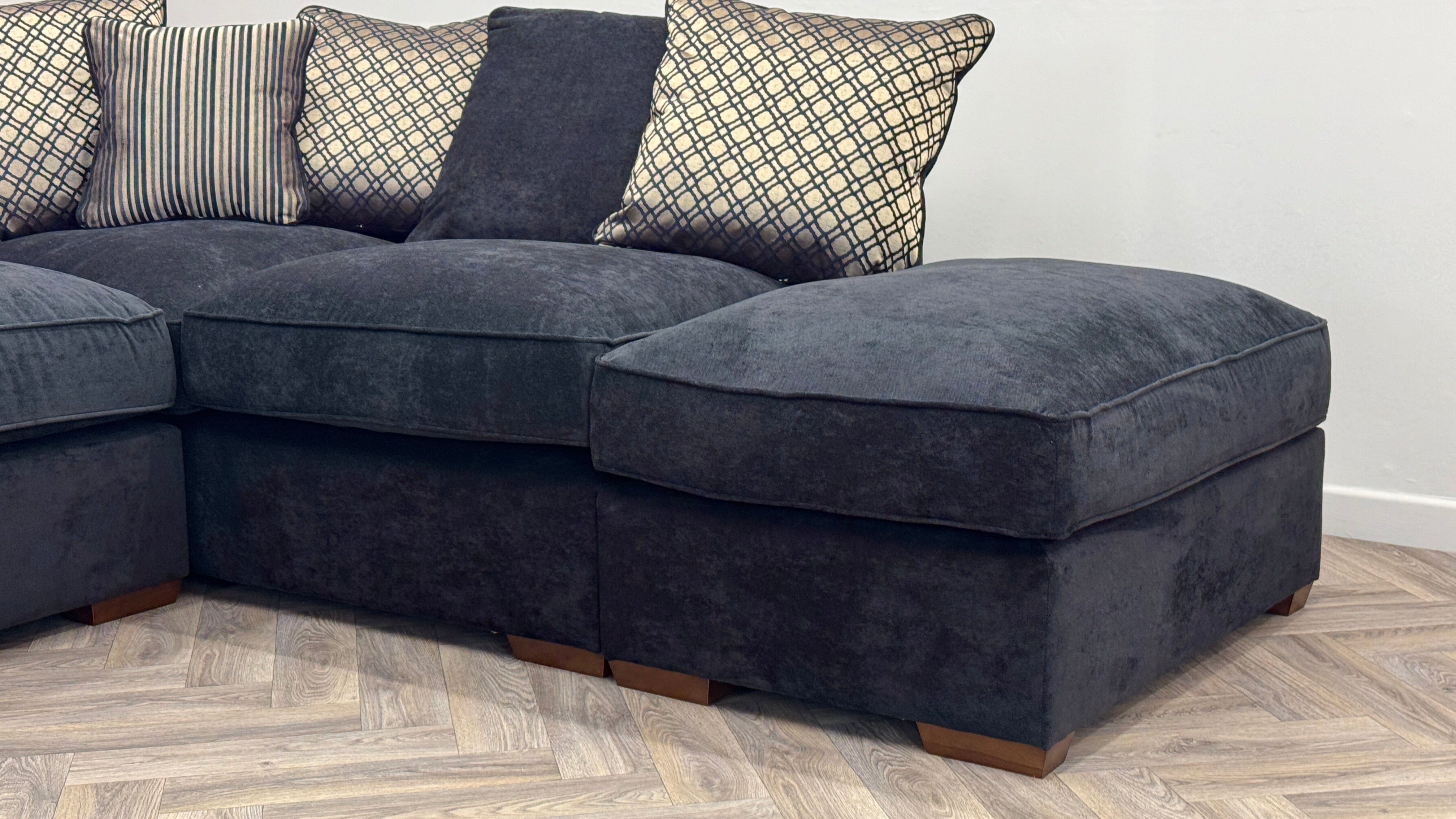 Fantasia Corner Sofa & Footstool Black Fabric Pillow Back