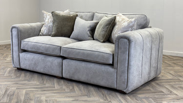 Roxy Night 3 Seater Sofa in soft grey fabric with plush cushions and a modern, stylish design on wooden floor