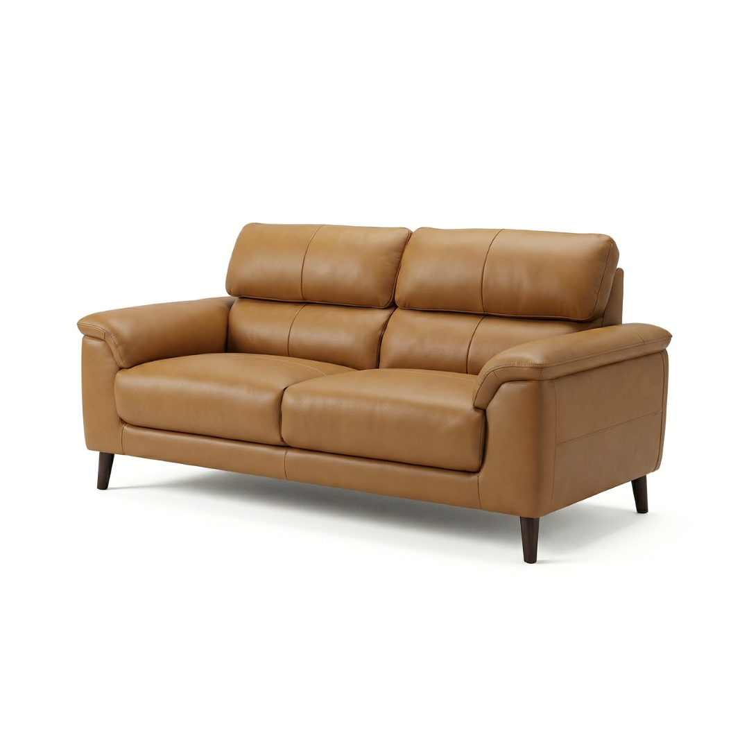 Three-seater sofa in smooth tan leather with padded back and seat cushions on dark tapered wooden legs against white background