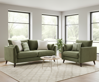 Green Penny 2 seater fabric sofa with matching armchair in bright living room with large windows and beige rug