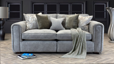 Roxy Night 3 Seater Sofa in gray fabric with decorative pillows and a green throw blanket in a modern living room setting
