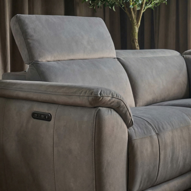 Close-up of Sorrento sofa adjustable padded headrest mechanism in grey fabric upholstery in room setting