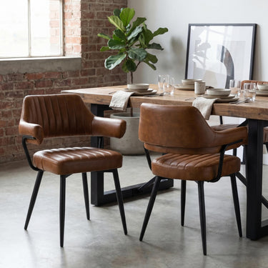 Cortez Leather Effect Dining Chair - Tan – styled in a dining room