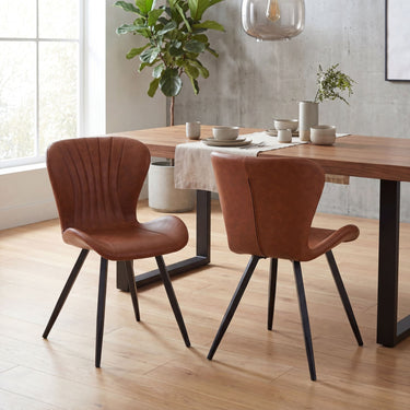Harlan Leather Effect Dining Chair - Tuscan Tan – styled in a dining room