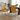 Mako Swivel Leather Effect Dining Chair - Yellow – styled in a dining room
