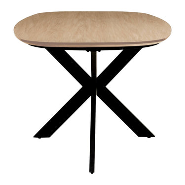 Sadina oval dining table end view showing the rounded oak-effect top and black crossed metal base