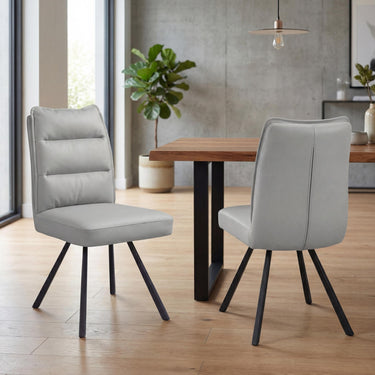 Stellan Leather Effect Dining Chair - Light Grey – styled in a dining room