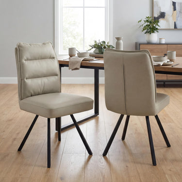Stellan Leather Effect Dining Chair - Taupe – styled in a dining room